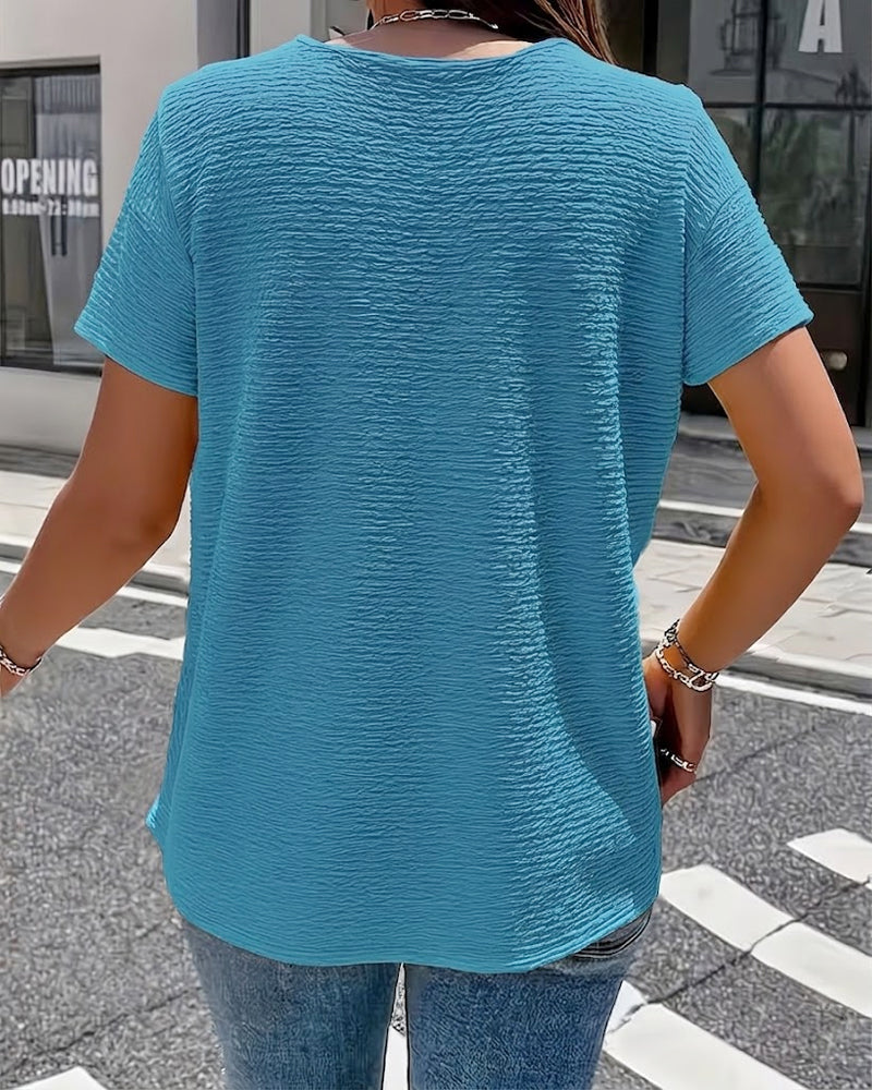Camiseta con cuello Peter Pan y botones