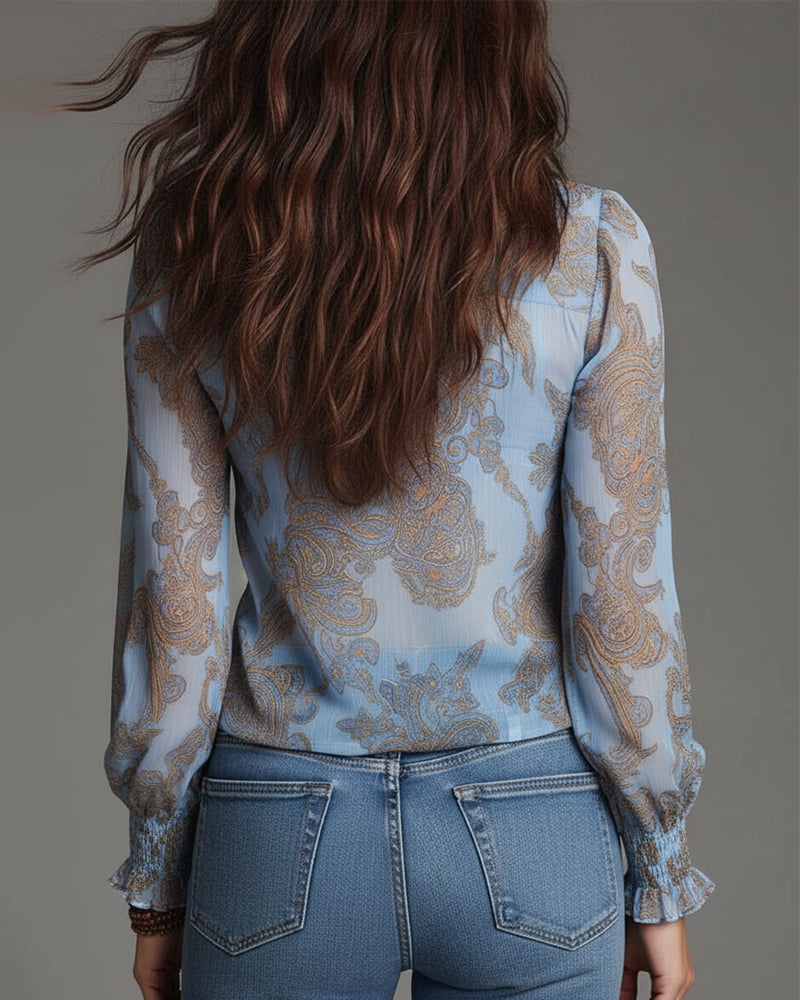 Blusa retro con media cremallera y volante