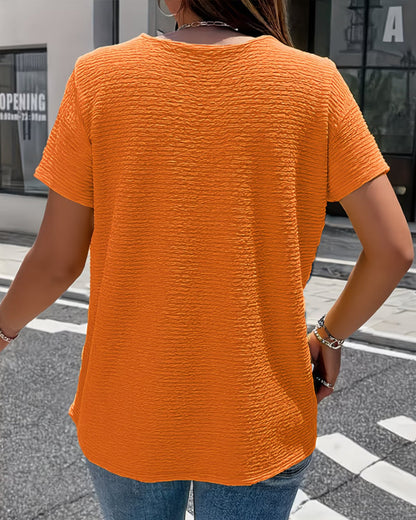 Camiseta con cuello Peter Pan y botones