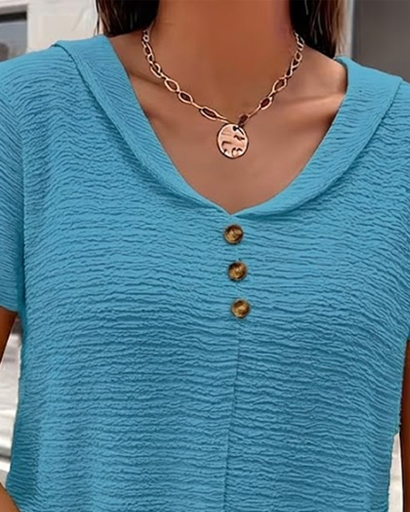 Camiseta con cuello Peter Pan y botones