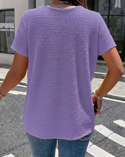 Camiseta con cuello Peter Pan y botones