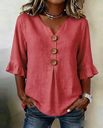 Blusa con cuello en V, botones de madera y mangas con volante