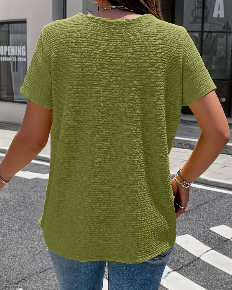 Camiseta con cuello Peter Pan y botones