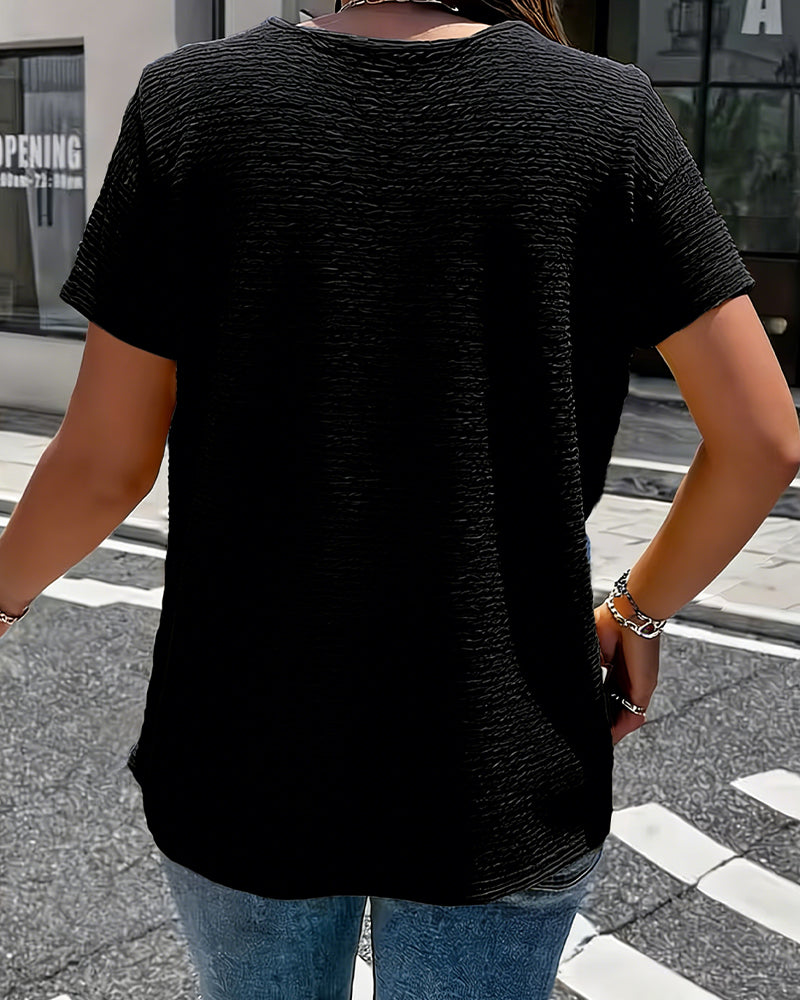 Camiseta con cuello Peter Pan y botones