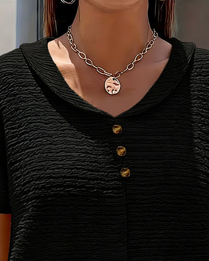 Camiseta con cuello Peter Pan y botones